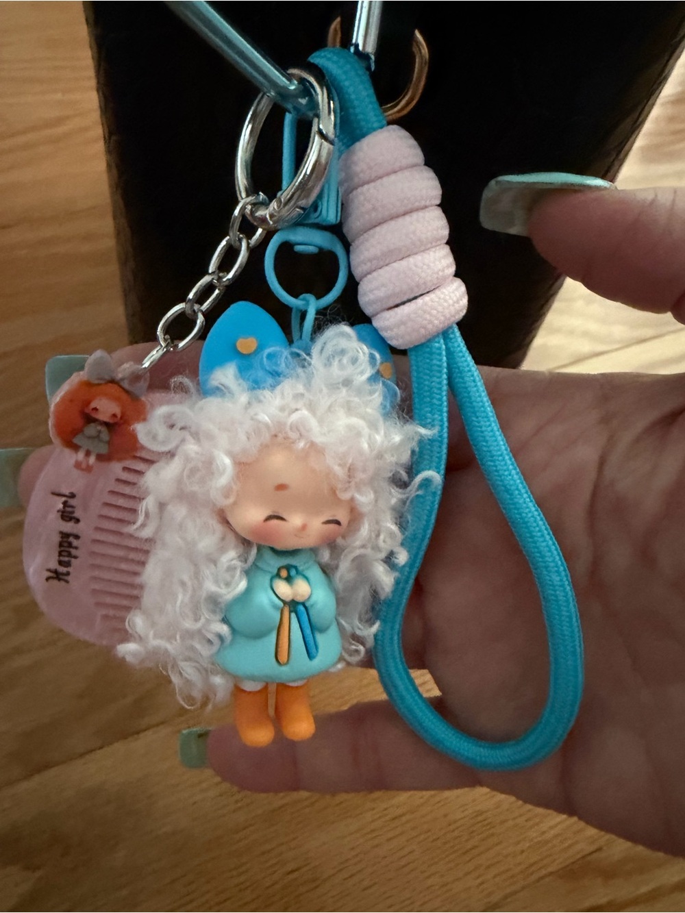 Source Unknown Blue Curly-Hair Girl Bag Charm with White Hair